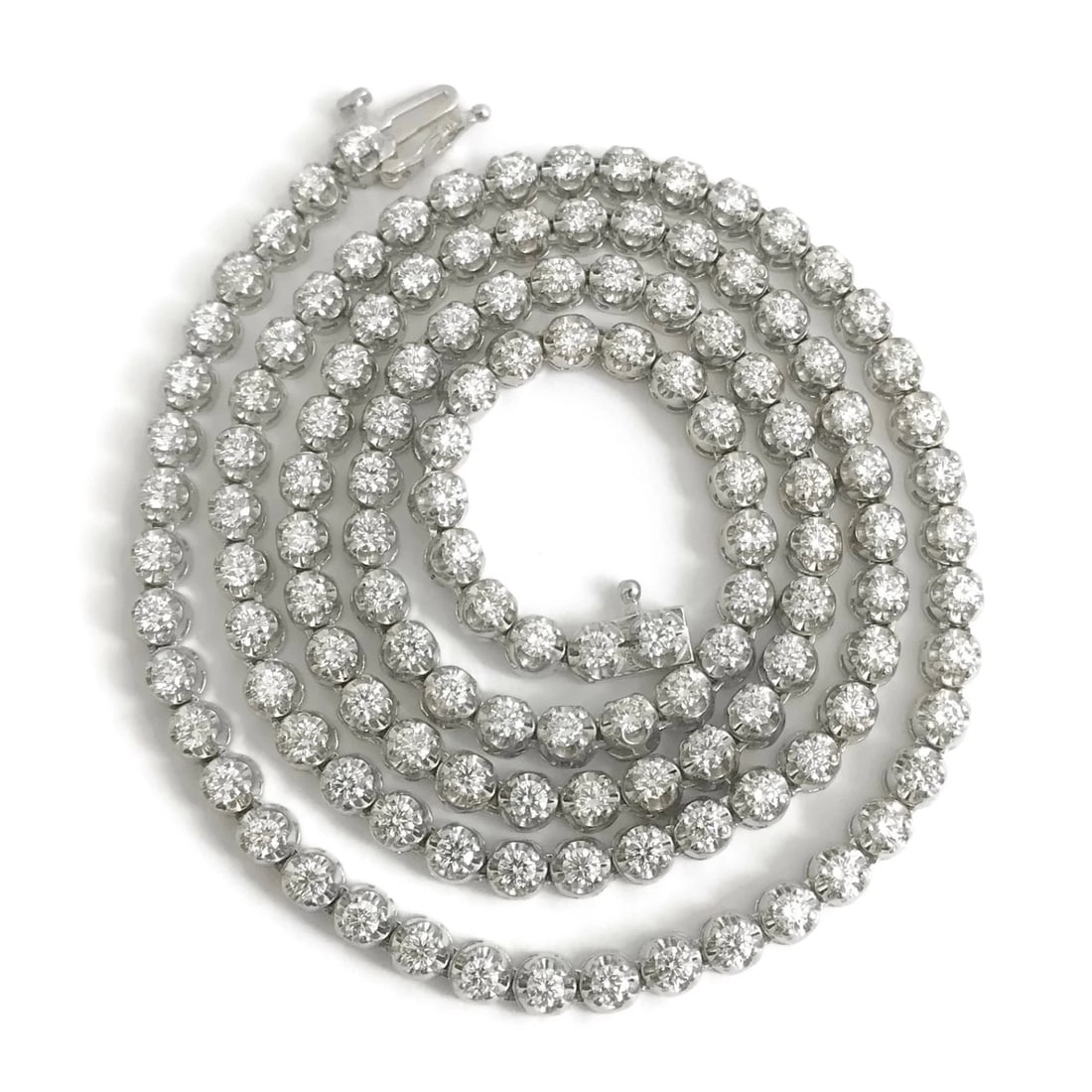 Long Diamond Tennis Necklace 14K White Gold, 7.92 CTW, 23 Inches, 42.26 Grams: Long Diamond Tennis Necklace 14K White Gold, 7.92 CTW, 23 Inches, 42.26 Grams Make a statement with this gorgeous diamond necklace. Please let us know if you have any questions. Diamonds: 132 round br