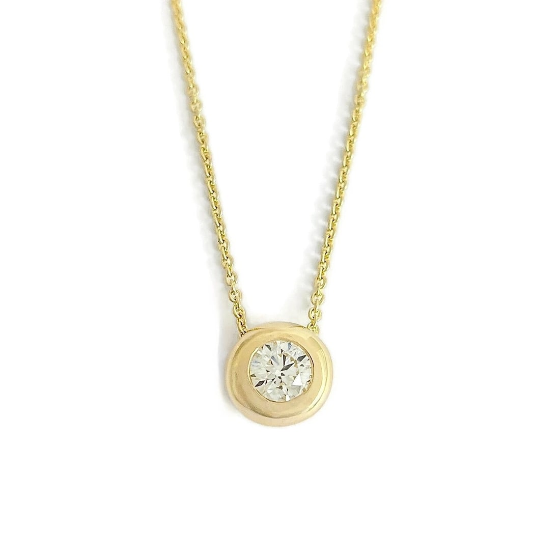 Round Solitaire Diamond Thick Bezel Pendant Necklace 14K Yellow Gold, .80 CT: Round Solitaire Diamond Thick Bezel Pendant Necklace 14K Yellow Gold, .80 CT This is a beautiful necklace with a pendant that slides on the chain. Please let us know if you have any questions :) Diamo