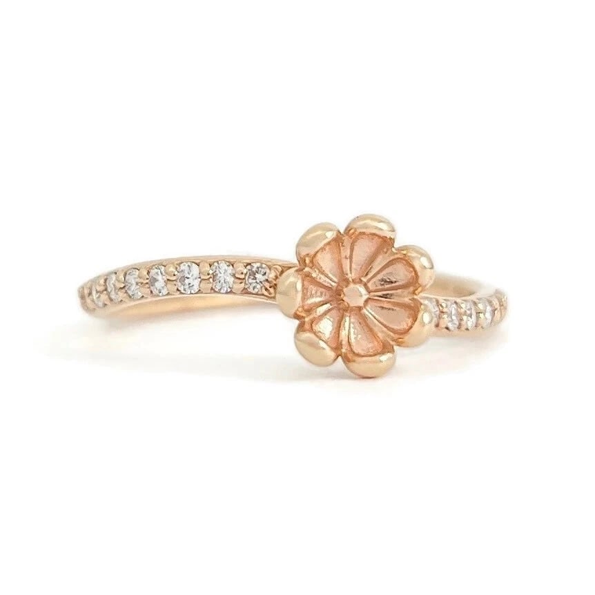 Curved Diamond Flower Ring 14K Pink Rose Gold, Size 7: Curved Diamond Flower Ring 14K Pink Rose Gold, Size 7 This is a lovely ring. Don't hesitate to ask any questions! Diamonds: 16 round brilliant cuts .16 ctw; G, SI1 Metal: 14K rose gold Weight: 2.05 gr
