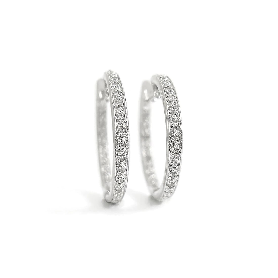 Pave Diamond Inside-Out Hoop Earrings 14K White Gold, 1 Inch, .70 CTW: Pave Diamond Inside-Out Hoop Earrings 14K White Gold, 1 Inch, .70 CTW These are beautiful earrings! Please let us know if you have any questions. Diamonds: 48 round brilliant cuts, .70 ctw, G-H,
