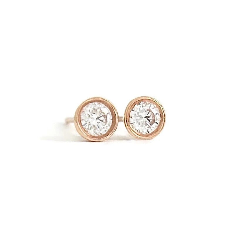 Round Bezel Diamond Stud Earrings 14K Pink Rose Gold .30 CTW: Round Bezel Diamond Stud Earrings 14K Pink Rose Gold .30 CTW These are beautiful earrings! Please let us know if you have any questions. Diamonds: 2 round brilliant cuts, .30 ctw, F, SI1 Metal: 14K