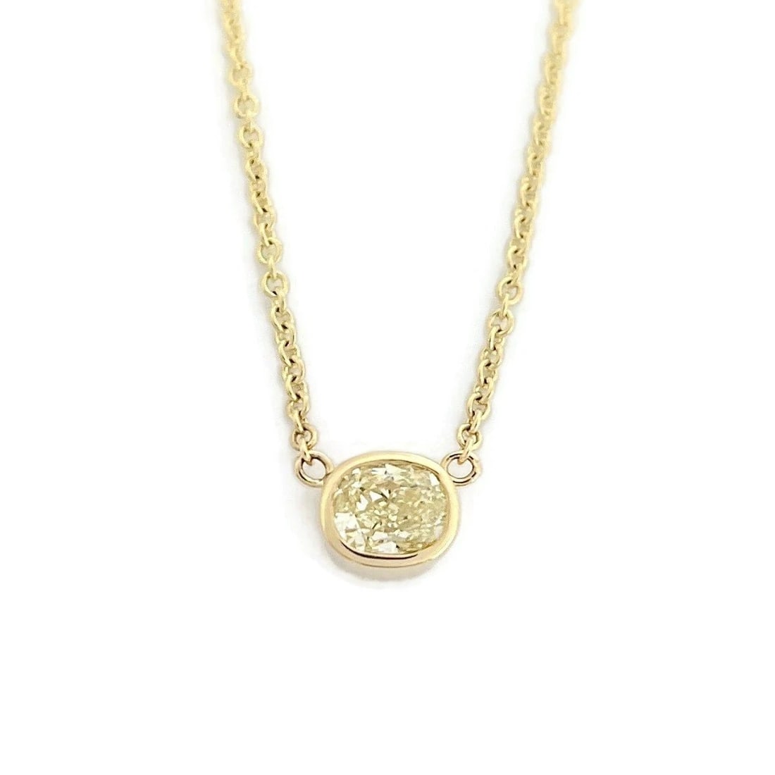 Fancy Yellow Oval Diamond Solitaire Pendant Necklace 14K Yellow Gold, .46 CT: Fancy Yellow Oval Diamond Solitaire Pendant Necklace 14K Yellow Gold, .46 CT This is a lovely necklace. Please let us know if you have any questions :) Diamonds: 1 oval, .46 ct, fancy yellow, VS2 Meta