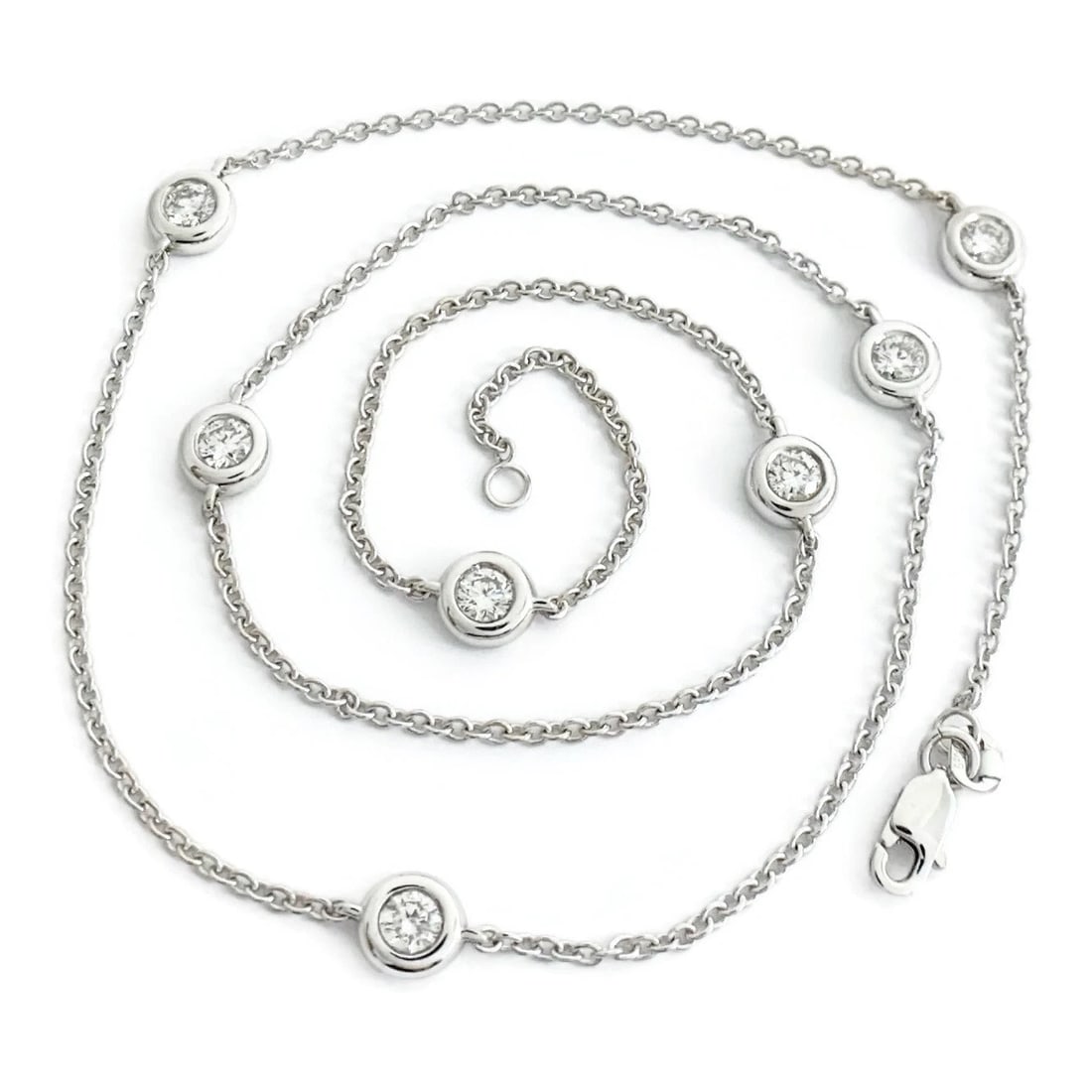 Round Diamond Bezel Station Necklace 14K White Gold 1.09 CTW, 17.5 Inches: Round Diamond Bezel Station Necklace 14K White Gold 1.09 CTW, 17.5 Inches Make a statement with this beautiful necklace. Please let us know if you have any questions :) Diamonds: 7 round brilliant