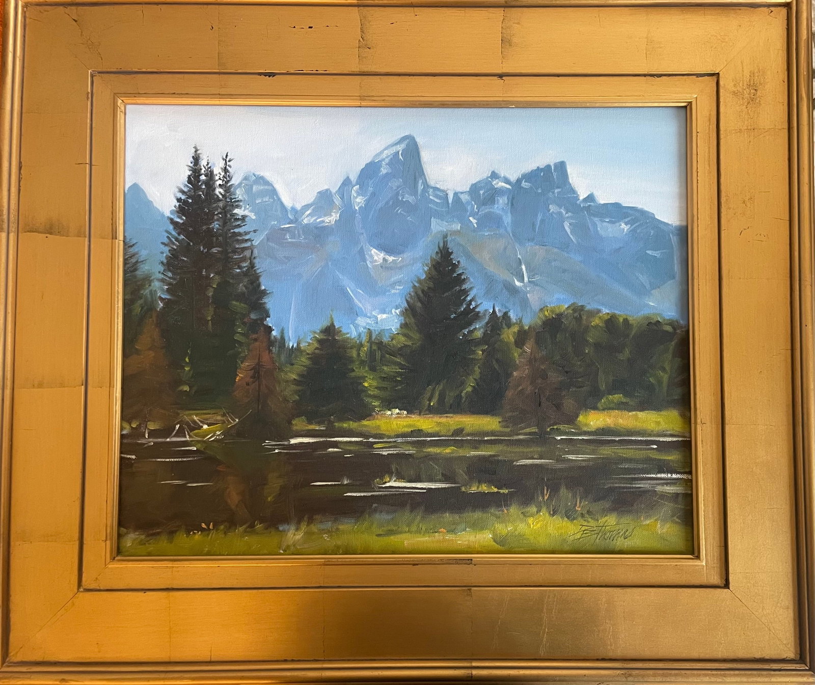 Grand Tetons with gold frame: Artist: DB Thomas Title:Grand Tetons with gold frame Description: Paintings of the Grand Tetons are highly valued due to their iconic status as a natural landmark Materials:Oil on canvas