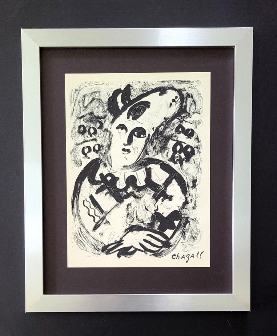 MARC CHAGALL + 1957 BEAUTIFUL SIGNED PRINT MOUNTED IN NEW FRAME: This is a Beautiful and Scarce 1957 Print after MARC CHAGALL FACSIMILE INK SIGNED From his Lithographs Collection Mounted in an acid free black board and Framed Covering an area of 15x12in. Printed in