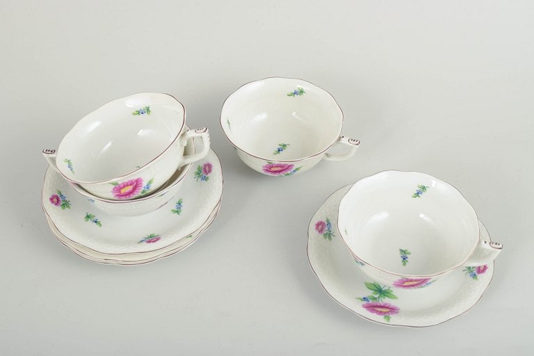 Herend, Hungary. Set of four porcelain teacups with saucers with flowers in pink and blue tones. - 2
