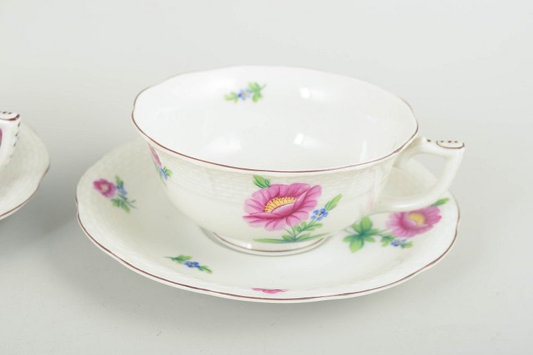 Herend, Hungary. Set of two porcelain teacups with saucers with flowers in pink and blue tones. - 3