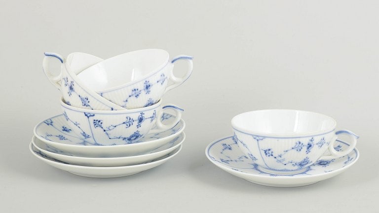 Royal Copenhagen, Denmark. Blue Fluted Plain, set of four porcelain tea cups with decoration in (1 of 4)