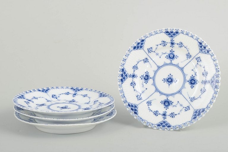Royal Copenhagen, Denmark. Blue Fluted Full Lace, set of four porcelain cake plates with decoration: Royal Copenhagen Blue Fluted Full Lace, set of four cake plates. Set of four hand-painted porcelain cake plates from the Blue Fluted Full Lace service with classic underglaze decoration in cobalt blue