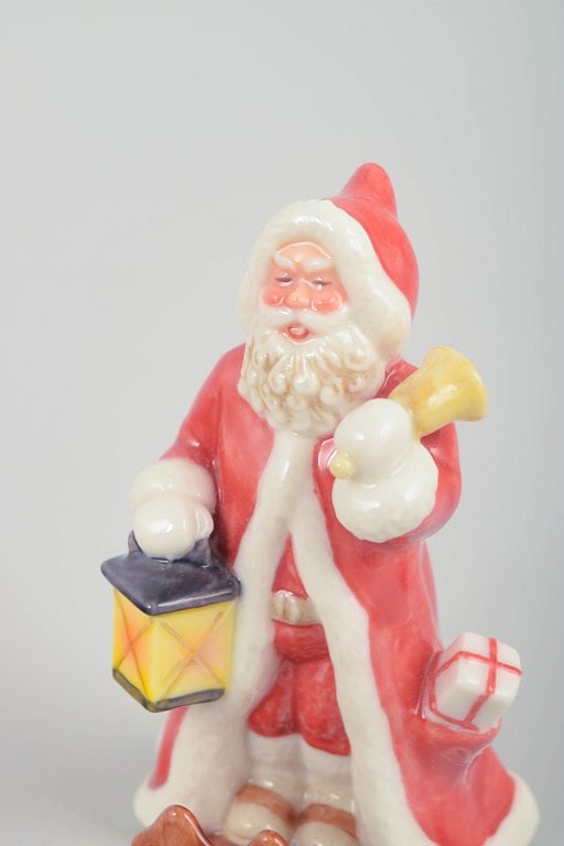 Royal Copenhagen, Denmark. Rare Santa Claus porcelain figurine with lantern and gift sack. Dated - 2