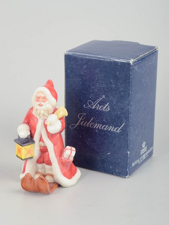 Royal Copenhagen, Denmark. Rare Santa Claus porcelain figurine with lantern and gift sack. Dated - 4