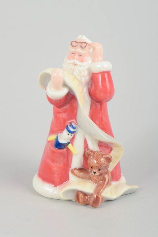 Royal Copenhagen, Denmark. Rare Santa Claus porcelain figurine with teddy bear and toy. Dated 2003. (1 of 5)