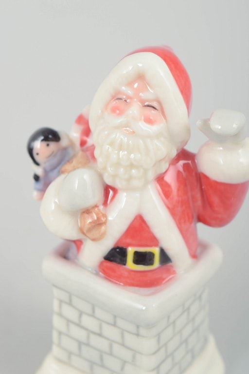 Royal Copenhagen, Denmark. Rare Santa Claus porcelain figurine standing in a chimney holding a small - 2