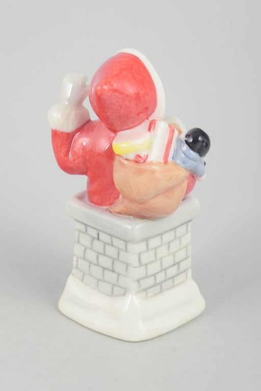 Royal Copenhagen, Denmark. Rare Santa Claus porcelain figurine standing in a chimney holding a small - 3
