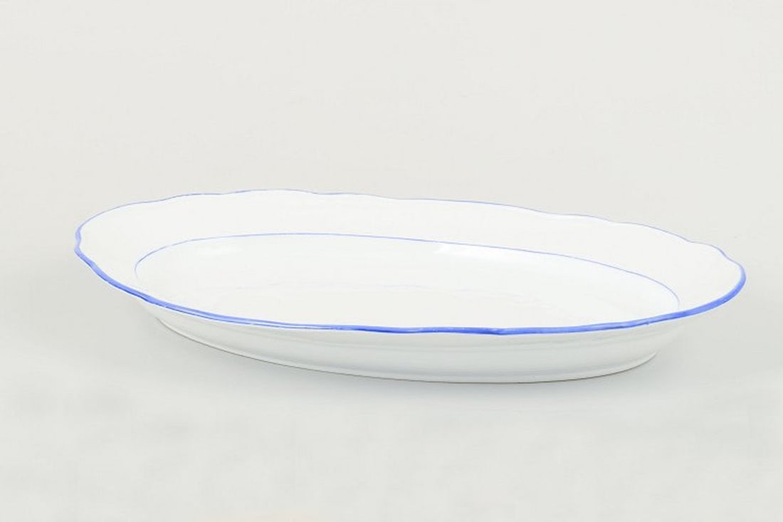 Meissen, Germany. Serving platter in white-glazed porcelain with scalloped rim and blue trim. Circa (1 of 4)