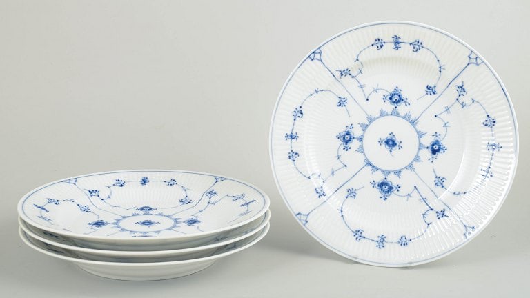 Royal Copenhagen, Denmark. Blue Fluted Plain, set of four porcelain dinner plates with decoration in (1 of 4)