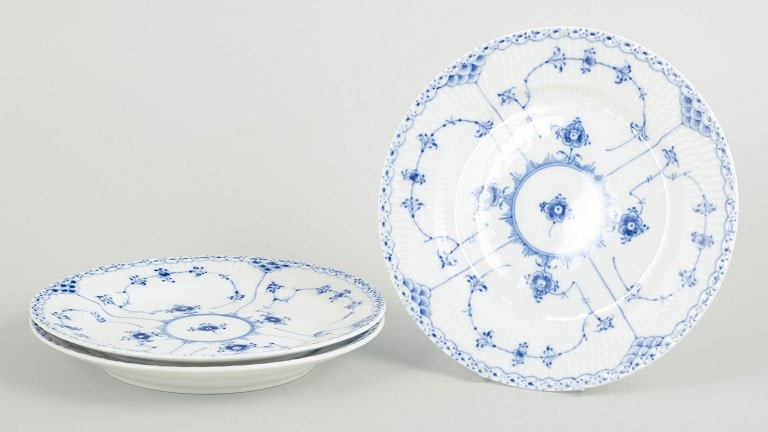 Royal Copenhagen, Denmark. Blue Fluted Half Lace, set of three porcelain salad plates with: Royal Copenhagen Blue Fluted Half Lace, set of three salad plates. Set of three hand-painted porcelain salad plates from the Blue Fluted Half Lace service with classic underglaze decoration in cobalt 