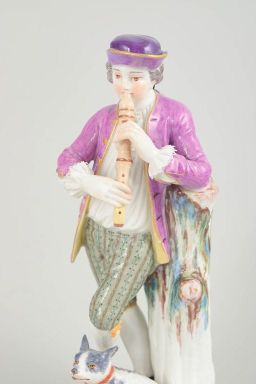 Meissen, Germany. Porcelain figurine, nobleman with flute and dog with polychrome colors. 19th - 2