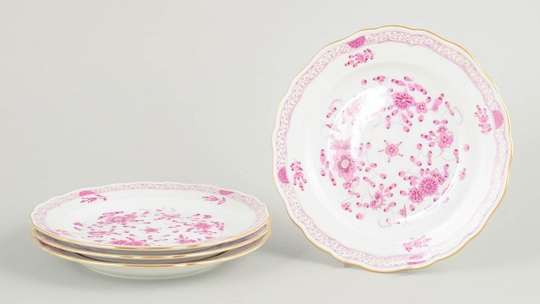 Meissen, Germany. Set of four porcelain "Pink Indian flower" salad plates with gilded rim. Circa: Meissen, set of four "Pink Indian flower" salad plates. Set of four salad plates in hand-painted porcelain with floral decoration in pink tones and gilded rim. First factory quality. Marked with