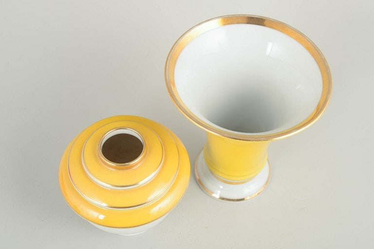 Germany. Two art deco small porcelain vases in yellow and white tones with gilded details. Approx. - 2