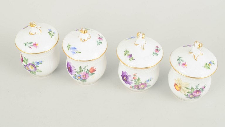 Royal Copenhagen, Denmark. Saxon Flower set of four porcelain lidded cream cups. Approx. 1960s. - 2