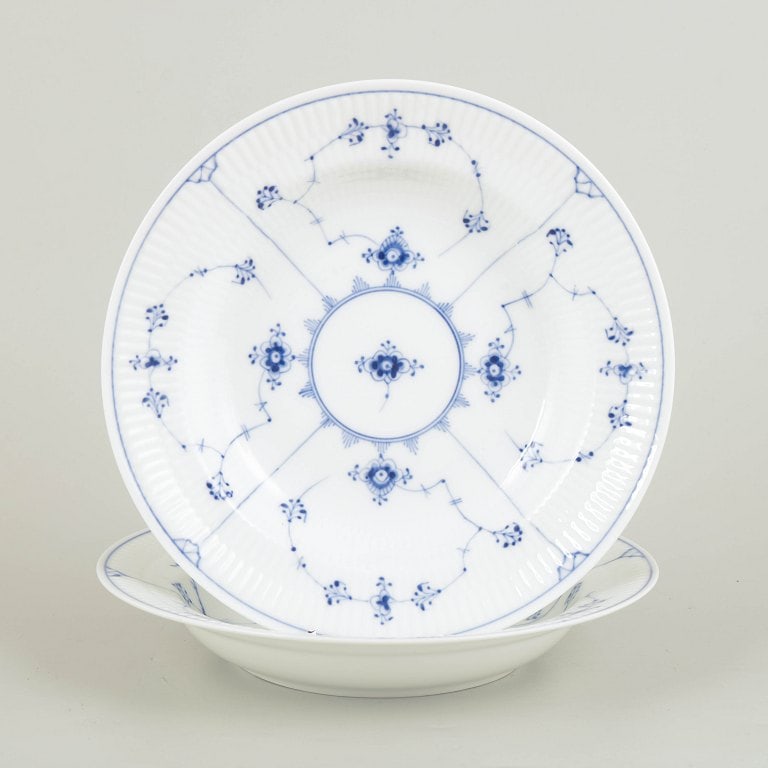 Royal Copenhagen, Denmark. Blue Fluted Plain set of two porcelain soup plates with underglaze cobalt: Royal Copenhagen Blue Fluted Plain two soup plates. Two hand-painted soup plates in the Blue Fluted Plain pattern, model 1/165, from the 1920s. First factory quality. Origin: Denmark. Material: Porcel