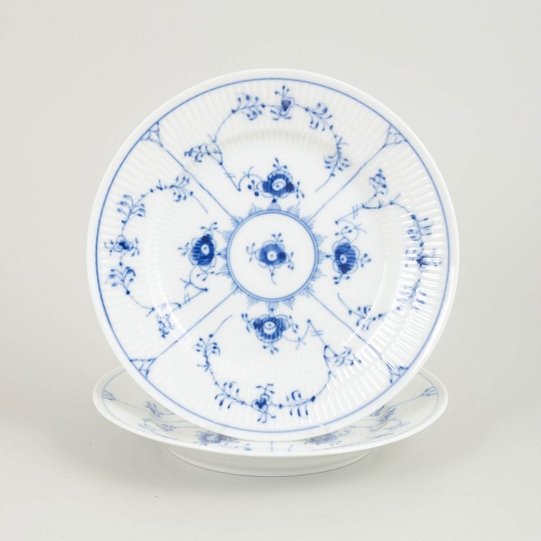 Royal Copenhagen, Denmark. Blue Fluted Plain, two porcelain salad plates with decoration in cobalt: Royal Copenhagen Blue Fluted Plain two salad plates. Two salad plates in hand-painted porcelain from Blue Fluted Plain with classic underglaze decoration in cobalt blue. Model 1/179. First factory