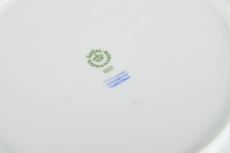 Royal Copenhagen, Denmark. Christmas Joy, set of four porcelain plates with a colourful border. - 4