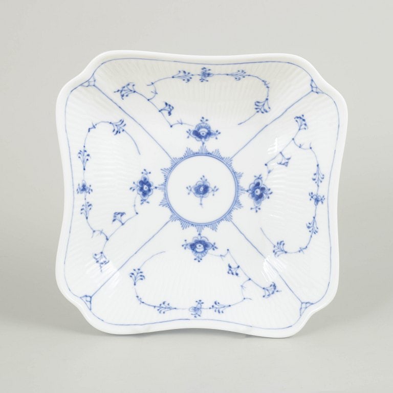 Royal Copenhagen, Denmark. Blue Fluted Plain, square porcelain bowl in cobalt underglaze. Dated: Royal Copenhagen Blue Fluted Plain, square bowl. Hand-painted square porcelain bowl decorated with the classic blue fluted pattern in cobalt underglaze. The bowl features softly curved sides with flut