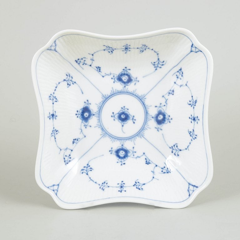 Royal Copenhagen, Denmark. Blue Fluted Plain, square porcelain bowl in cobalt underglaze. Dated: Royal Copenhagen Blue Fluted Plain, square bowl. Hand-painted porcelain bowl decorated with the classic blue fluted pattern in cobalt underglaze. The bowl features an elegant square form with gently c