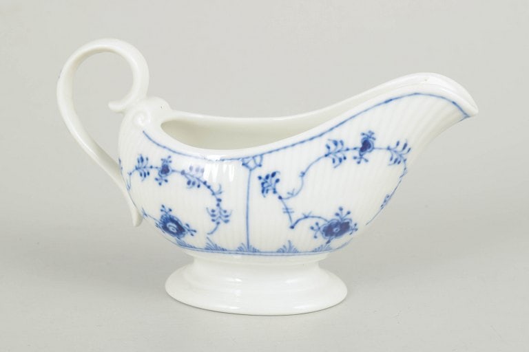 Royal Copenhagen, Denmark. Blue Fluted Plain porcelain sauce boat in underglaze blue. Dated 1967.: Royal Copenhagen, Blue Fluted Plain sauce boat. Small porcelain sauce boat decorated in underglaze blue with the classic Blue Fluted Plain pattern. Model 1/308, first quality, dated 1967. Origin: Denm
