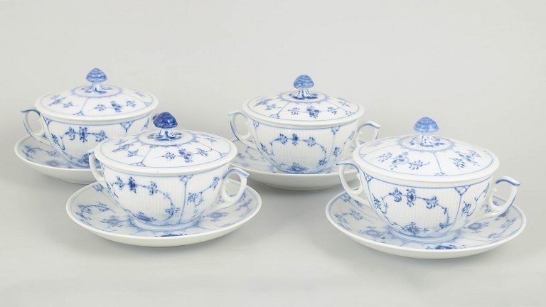 Royal Copenhagen, Denmark. Blue Fluted Plain set of four porcelain bouillon cups with saucers in (1 of 5)