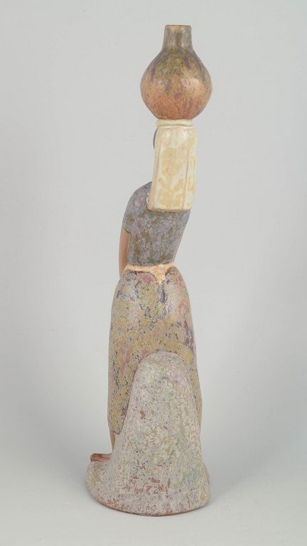 Lladró,, Spain. Porcelain figurine of woman with vessels in muted glaze tones. Approx. - 2