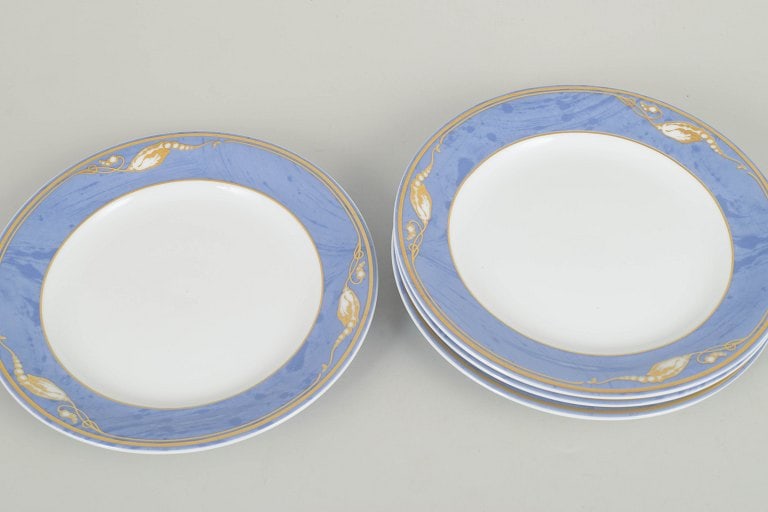 Royal Copenhagen, Denmark. Blue Magnolia, set of four porcelain plates. Approx. 1990s. - 2