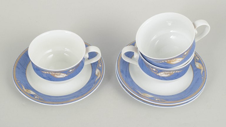 Royal Copenhagen, Denmark. Blue Magnolia, set of three porcelain teacups with matching saucers. - 2