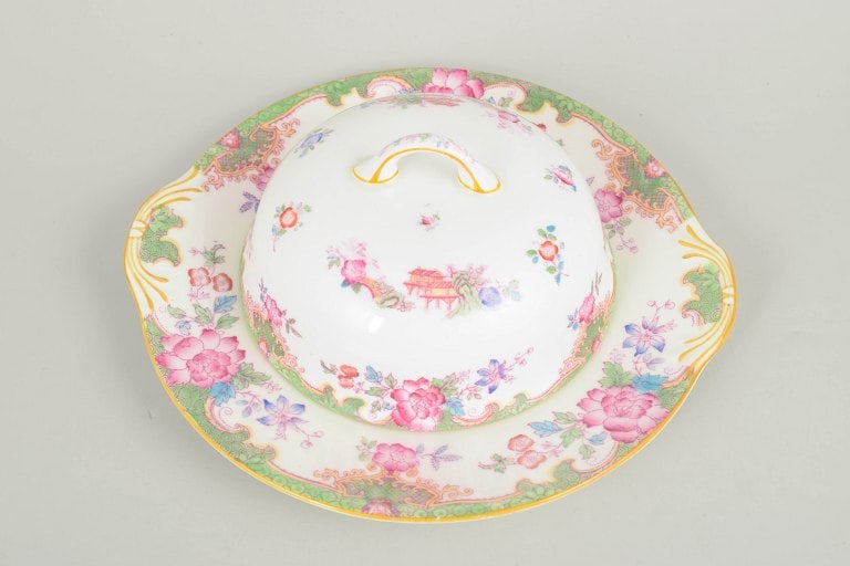Royal Doulton, England. "Temple" porcelain cheese dome with colourful floral decoration. Approx. - 2