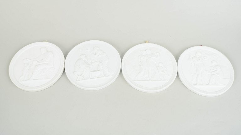 Royal Copenhagen, Denmark. Set of four biscuit wall plaques after Thorvaldsen. 20th century. (1 of 4)