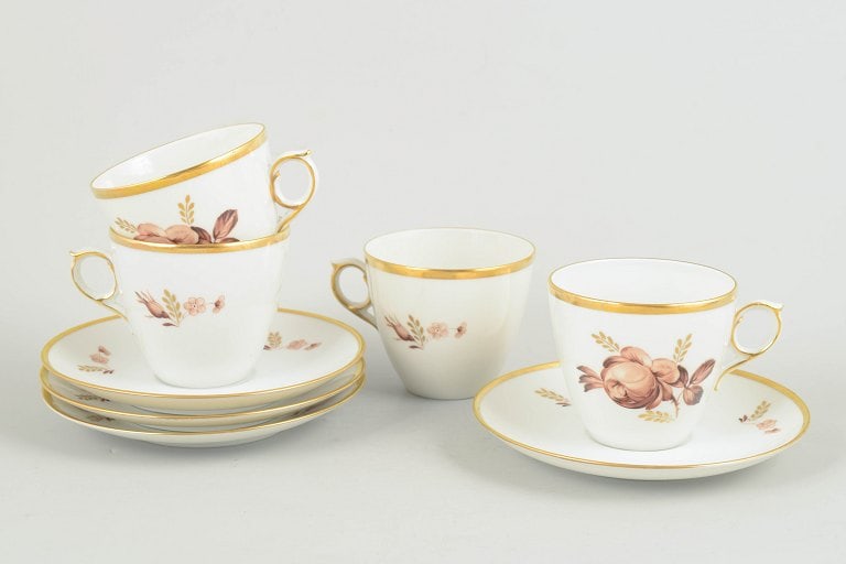 Royal Copenhagen, Denmark. Brown rose, set of four porcelain coffee cups with saucers with gilded (1 of 4)
