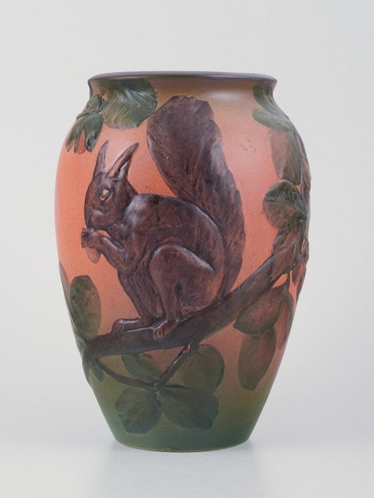 Ipsens, Denmark. Ceramic vase with squirrel. Glaze in orange and green tones. 1920s/30s. - 2