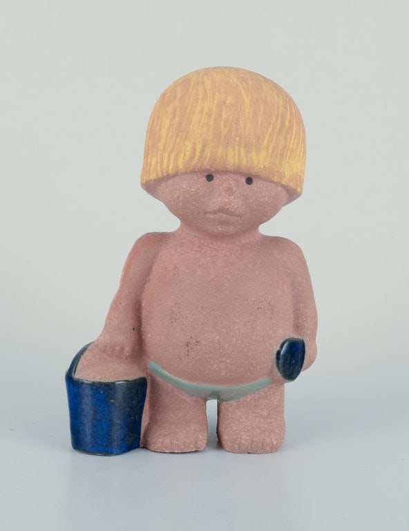 Lisa Larson for Gustavsberg. Stoneware figurine from "Children of the World" series.: Lisa Larson for Gustavsberg. Stoneware figurine from "Children of the World" series. Boy with a bucket. In perfect condition. Marked. Dimensions: H 12.5 cm x D 9.0 cm. Reserve: $140.00 Shipping: Domes
