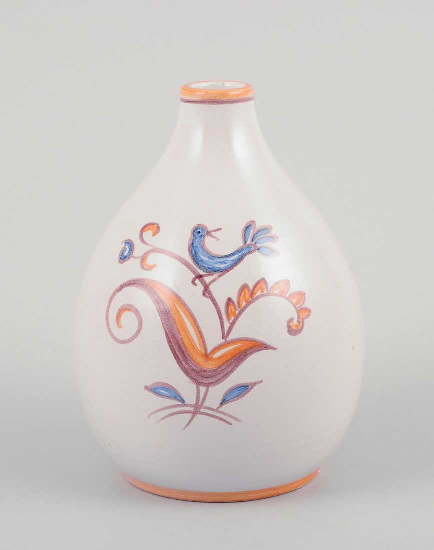 Gertrud Kudielka for Hjort, Bornholm. Ceramic vase with motif of bird on branch. Mid-20th C.: Gertrud Kudielka for Hjort, Bornholm. Unique ceramic vase. Motif of bird on branch. White glazed hand-painted stoneware. Mid 1900s. Marked. In perfect condition. Dimensions: Height 13.0 cm. x Diameter