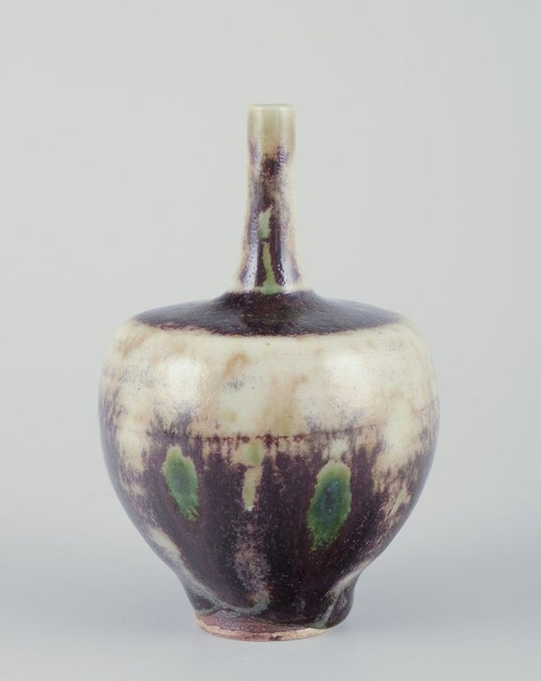 Höganäs, Sweden. Small unique ceramic vase. Glaze in violet tones. Approx. 1970/80s. - 2