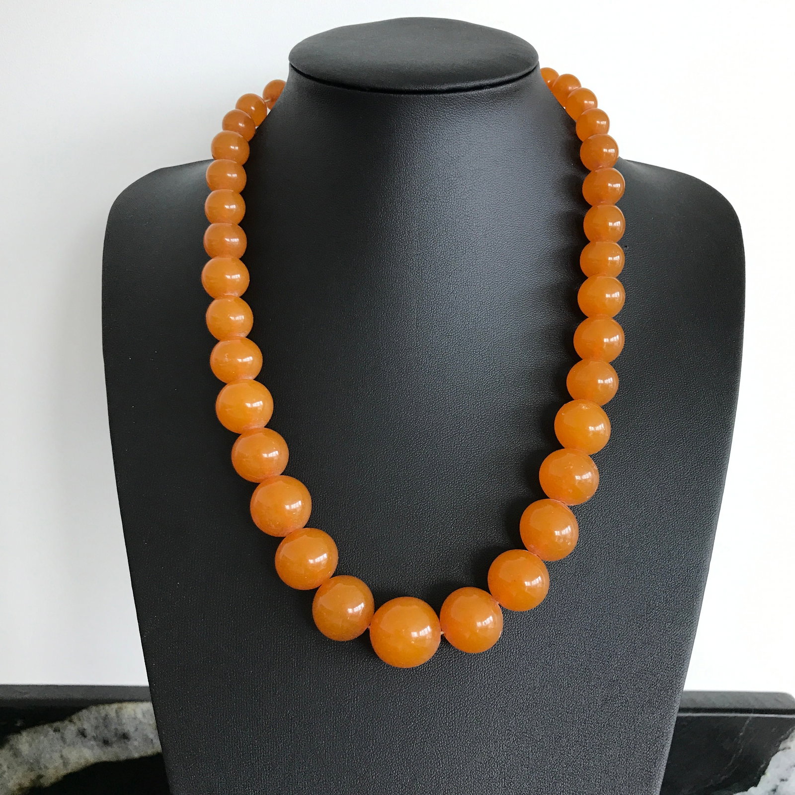 Alluring Amber Necklace made from Round Amber beads: Title:Alluring Amber Necklace made from Round Amber beads Metal:None Gemstone:Amber Weight:69.3 g Size:Bead size: From 18.75 to 12.0 mm Bead size: 0.738 to 0.472 inches Made of:(Reconstituted Amber