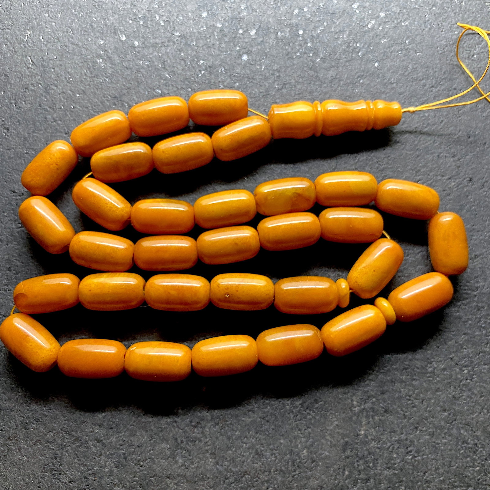 Phenomenal Amber Tesbih made from Barrel shaped Amber beads: Title:Phenomenal Amber Tesbih made from Barrel shaped Amber beads Metal:None Gemstone:Amber Weight:57.8 g Size:Bead size: 19.1 x 11.0 mm Bead size: 0.752 x 0.433 inches Made of:(Reconstituted Amber