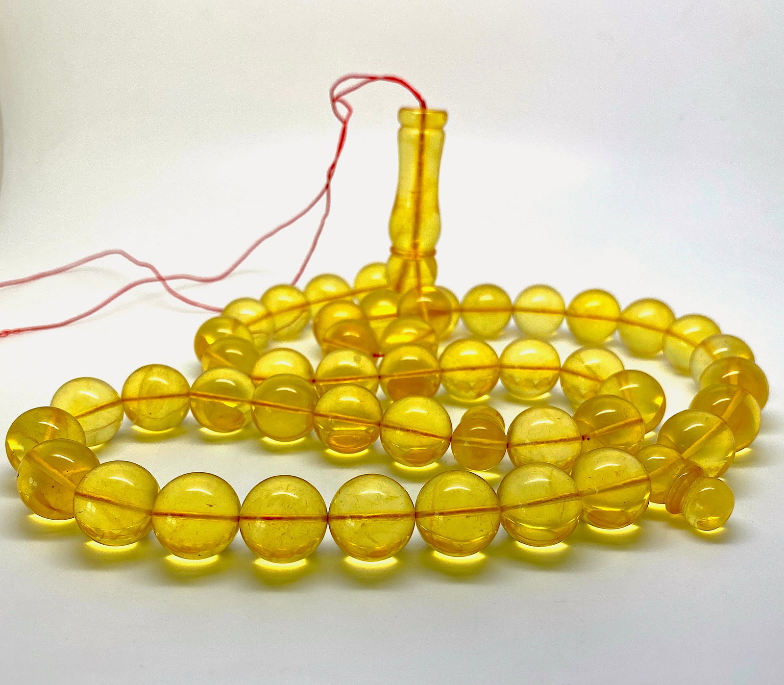 Outstanding Amber Tesbih made from Round Amber beads: Title:Outstanding Amber Tesbih made from Round Amber beads Metal:None Gemstone:Amber Weight:75.0 g Size:Bead size: 13.85 mm Bead size: 0.545 inches Made of:(Reconstituted Amber or Whole