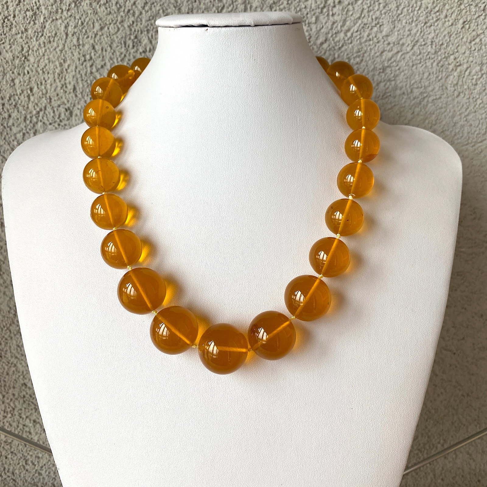 Remarkable Amber Necklace made from Round Amber beads: Title:Remarkable Amber Necklace made from Round Amber beads Metal:None Gemstone:Amber Weight:93.5 g Size:Size: 21.0 x 21.0 x 500.0 mm Size: 0.827 x 0.827 x 19.685 inches Bead size: From 17.0 to 21.0
