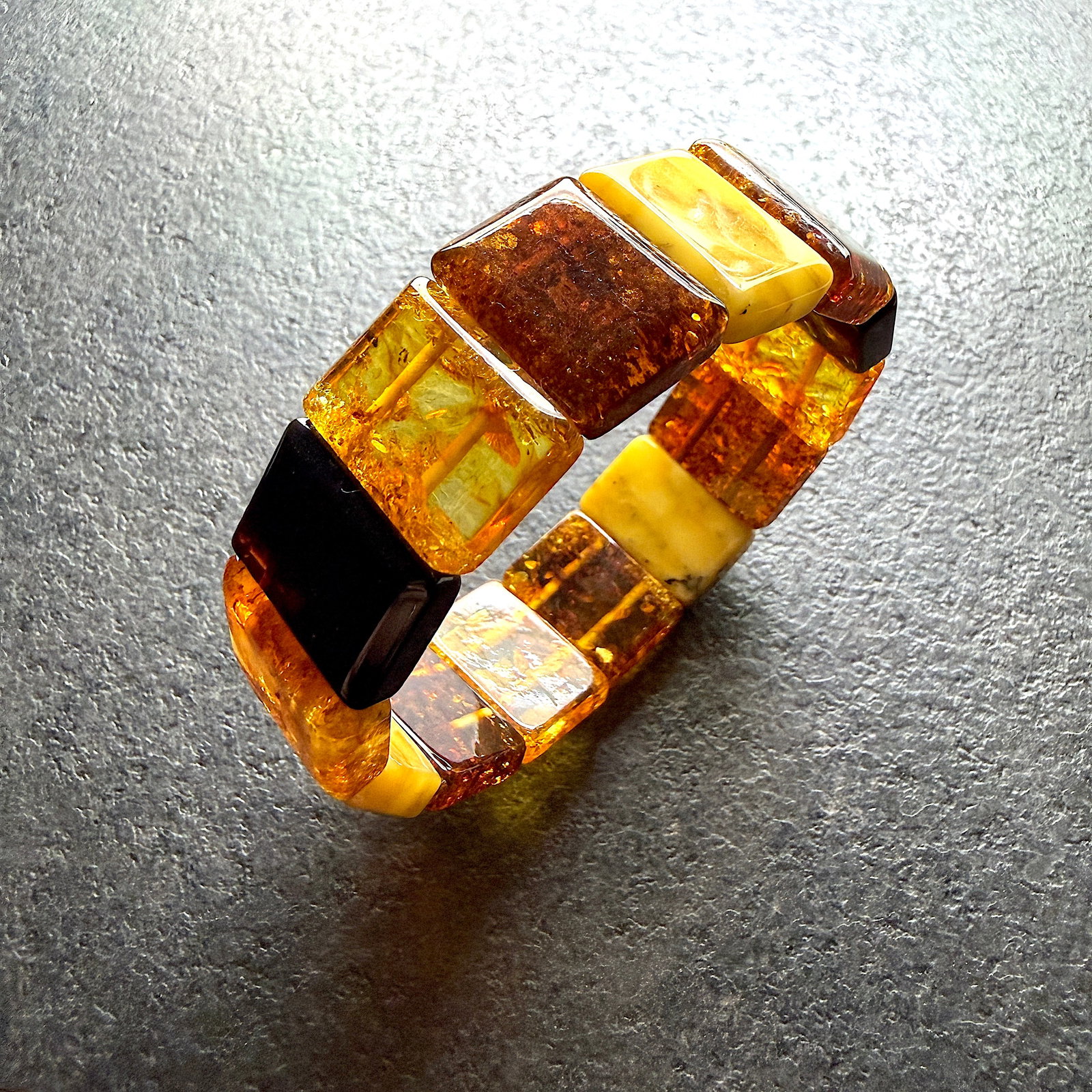 Grand Amber Cuff Bracelet: Title:Grand Amber Cuff Bracelet Metal:None Gemstone:Reconstituted Amber Weight:20.98 g Size:19x13mm; 65x19mm Made of:(Reconstituted Amber or Whole Stone):Reconstituted Amber Additional information:Amb