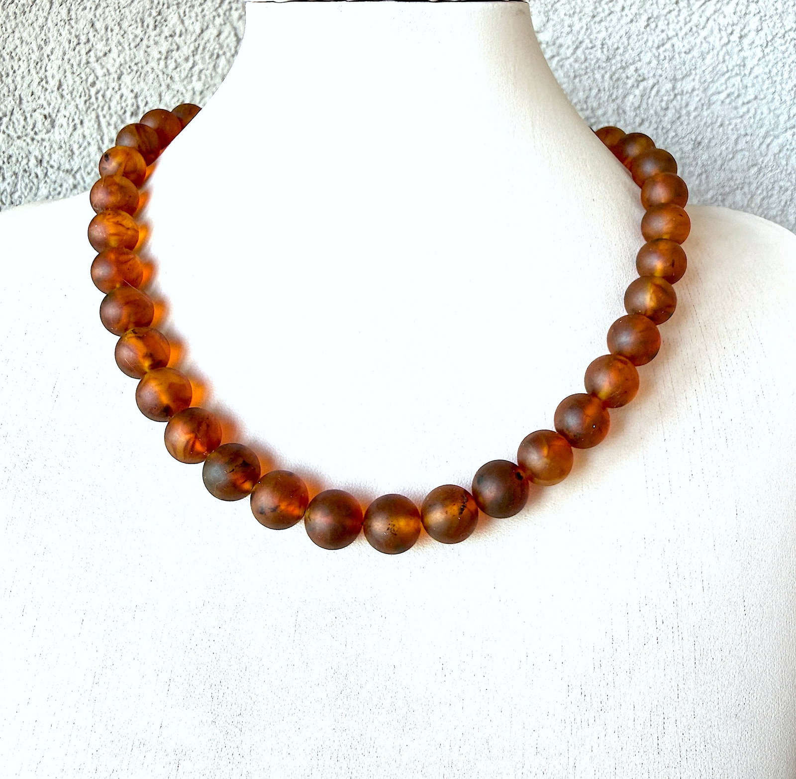 Amazing Amber Necklace: Title:Amazing Amber Necklace Metal:None Gemstone:Reconstituted Amber Weight:37 g Size:12mm; 48cm Made of:(Reconstituted Amber or Whole Stone):Reconstituted Amber Additional information:Amber does not