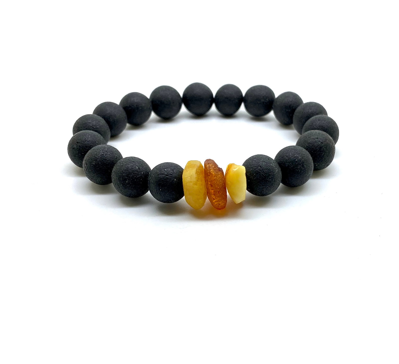 Staggering Amber Bracelet made from Round Amber beads: Title:Staggering Amber Bracelet made from Round Amber beads Metal:None Gemstone:Amber Weight:14.8 g Size:Bead size: 11.0 mm Bead size: 0.433 inches Made of:(Reconstituted Amber or Whole