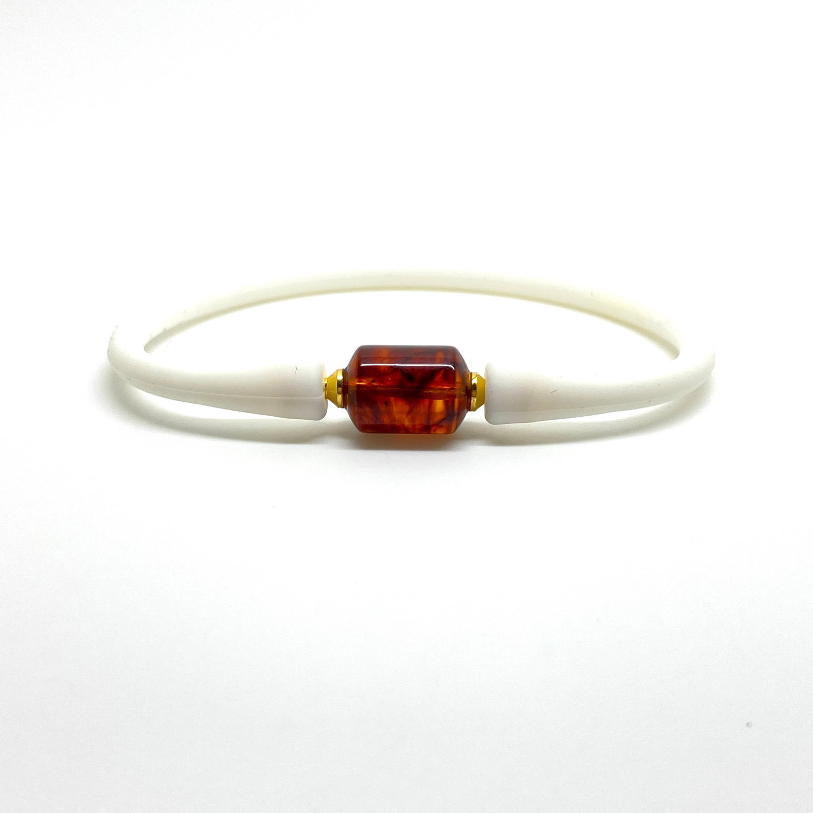 Extraordinary Amber Bracelet made from Doughnut shaped Amber bead: Title:Extraordinary Amber Bracelet made from Doughnut shaped Amber bead Metal:None Gemstone:Amber Weight:4.0 g Size:Bead size: 9.0 x 12.0 mm Bead size: 0.354 x 0.472 inches Wrist length: 160.0 mm